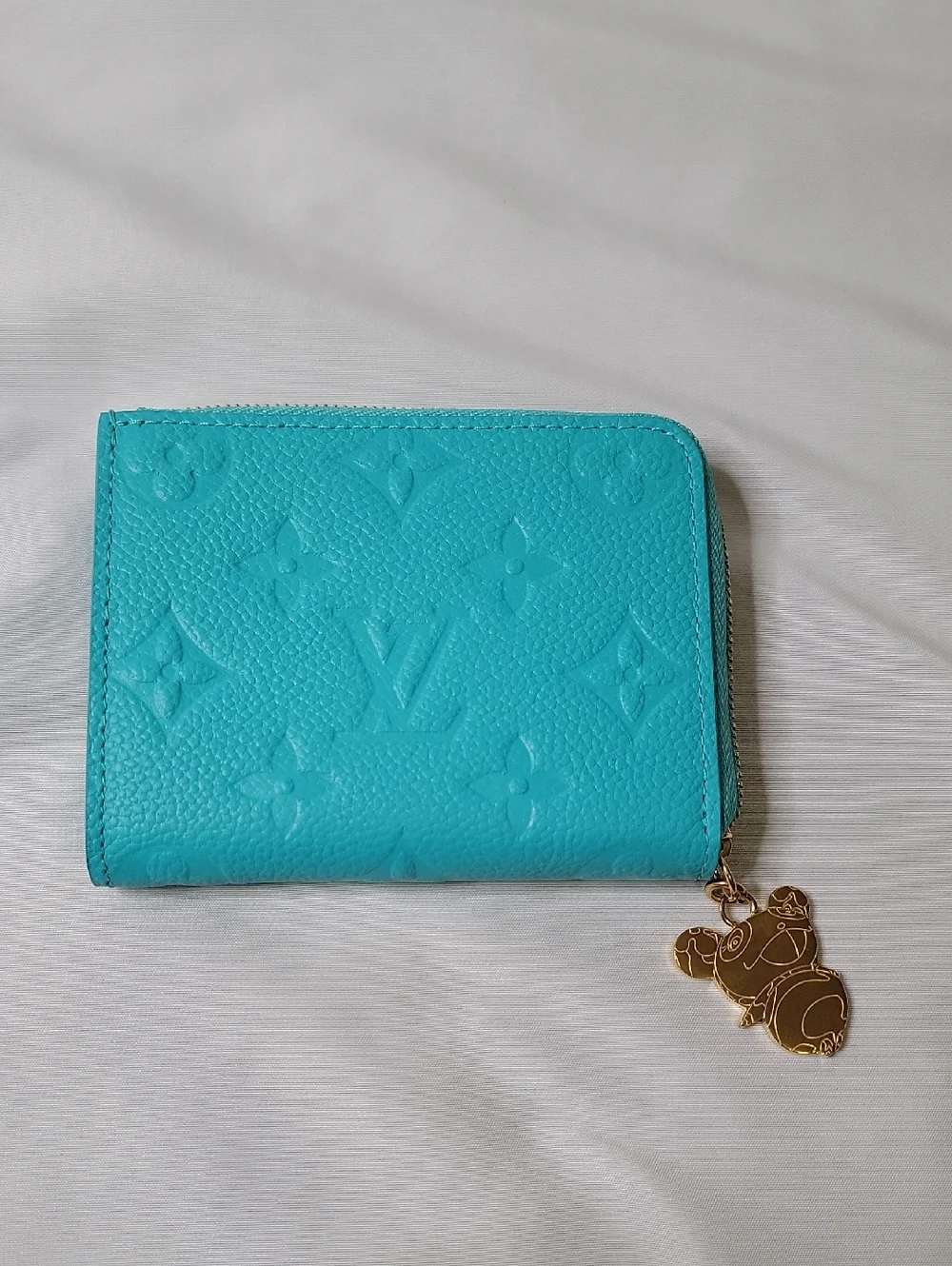 Louis Vuitton X TM Turquoise Embossed Monogram Zip Wallet